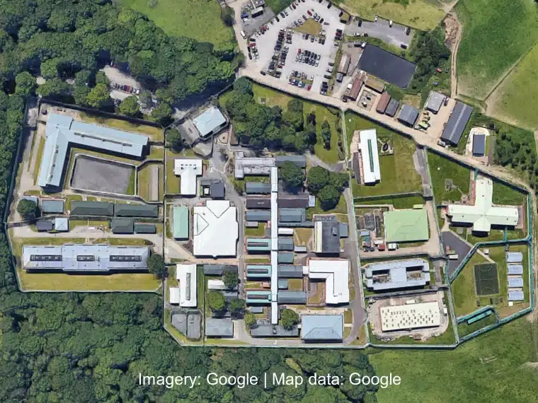 Aerial view of New Hall Prison, showing its modern buildings and well-kept grounds.